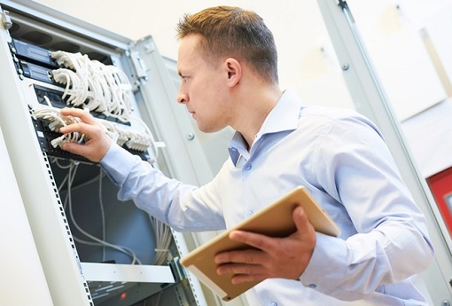 Networking service. network engineer administrator checking server hardware equipment of data center